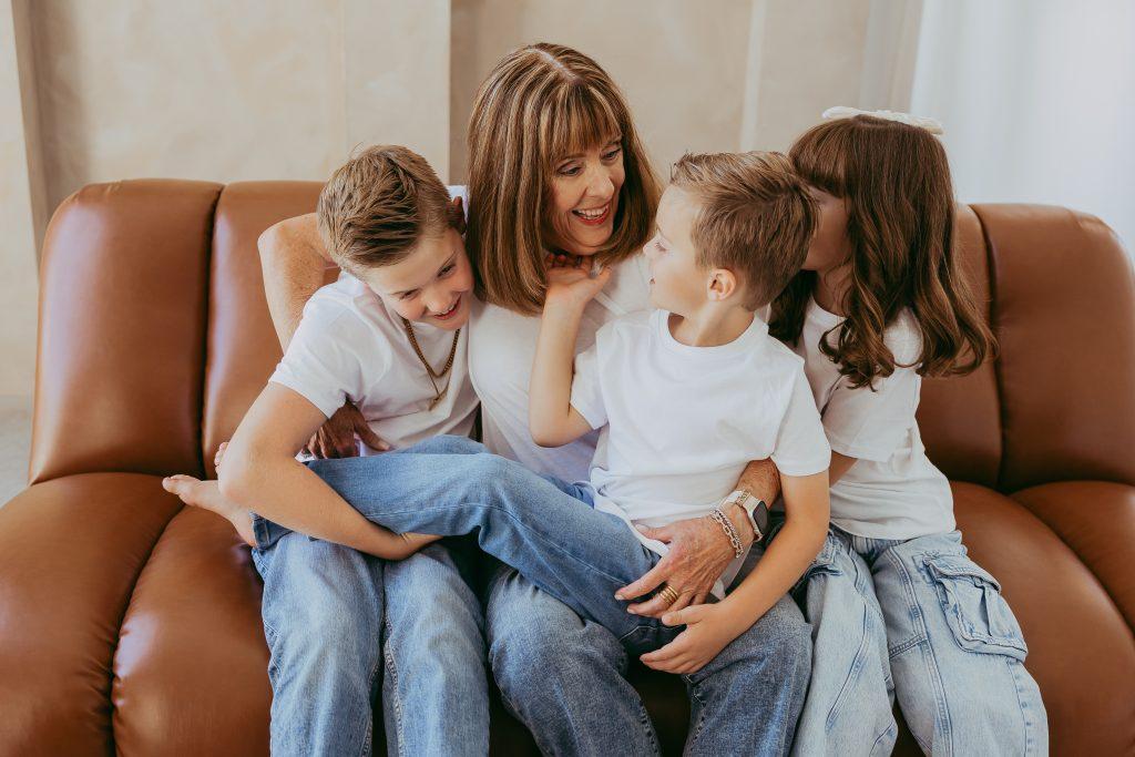 family picture with all the family in white shirts and jeans